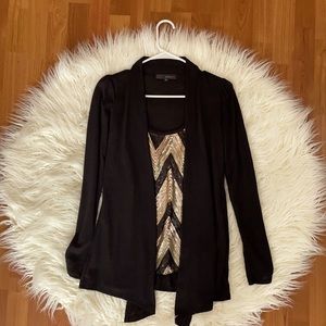 Sweater with attached sparkle shirt.